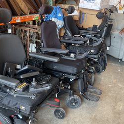Multiple Complex Rehab Power Chairs with tilt, recline, and elevate on most