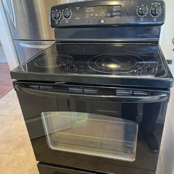 Kitchen Appliances (black) Stove, Microwave, And Dishwasher