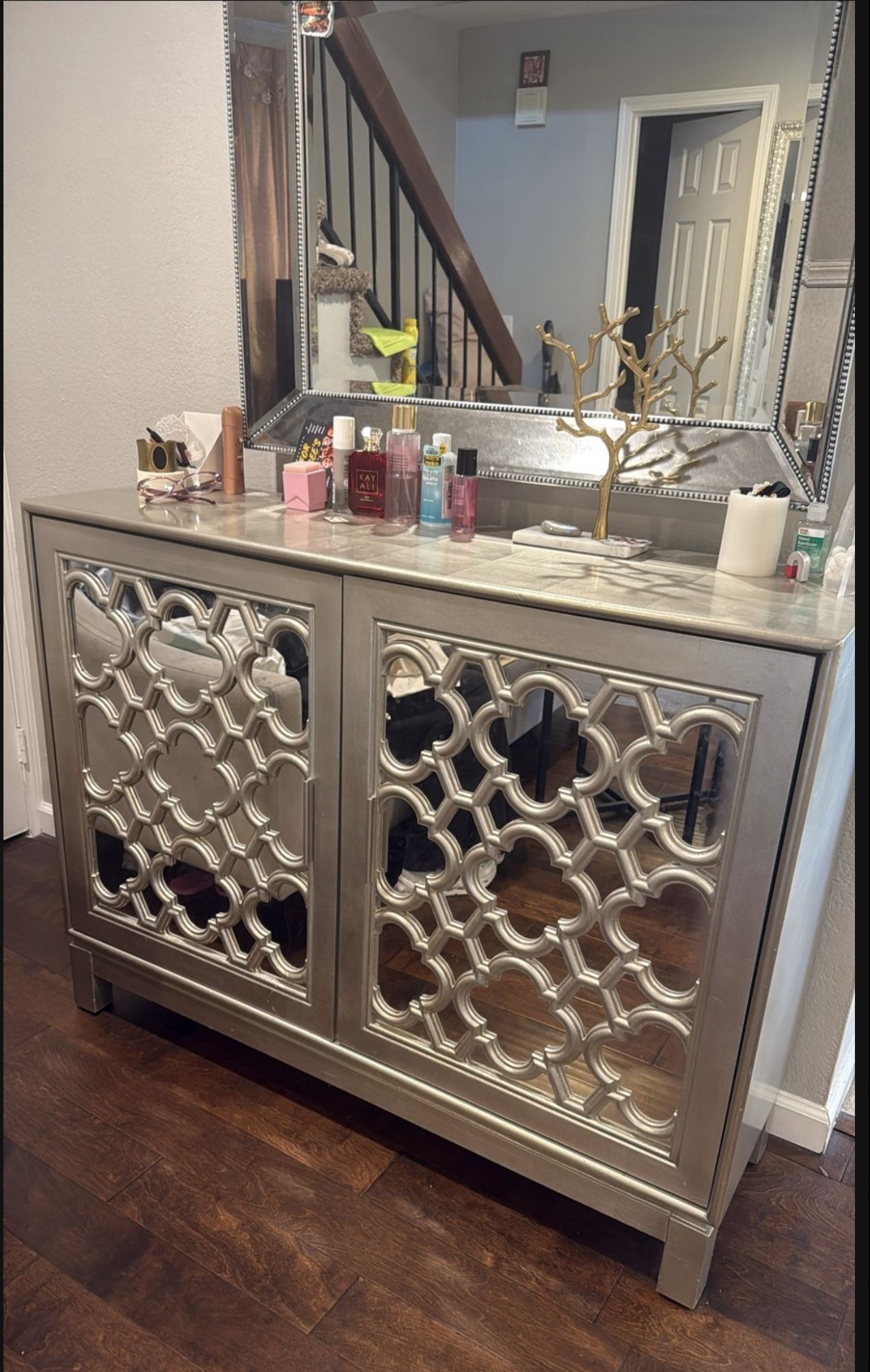 Elegant Mirrored Accent Cabinet with Decorative Trim and Marble-Style Top