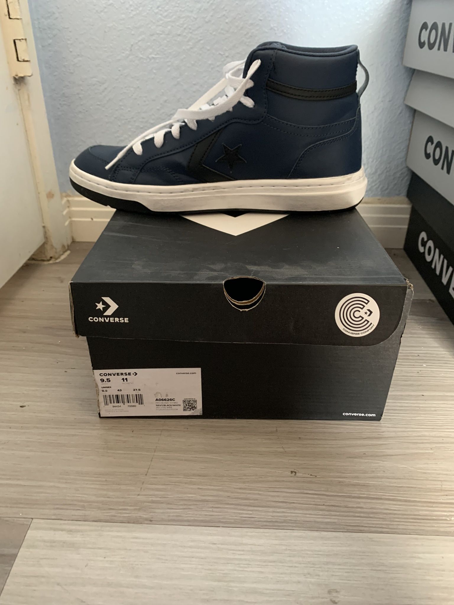 Blue and black converse