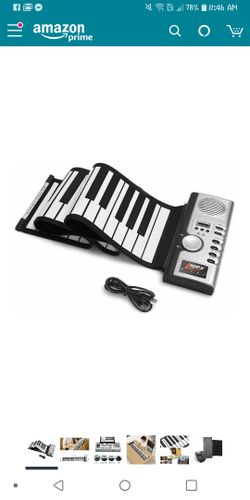 Brand new never used. Roll up piano