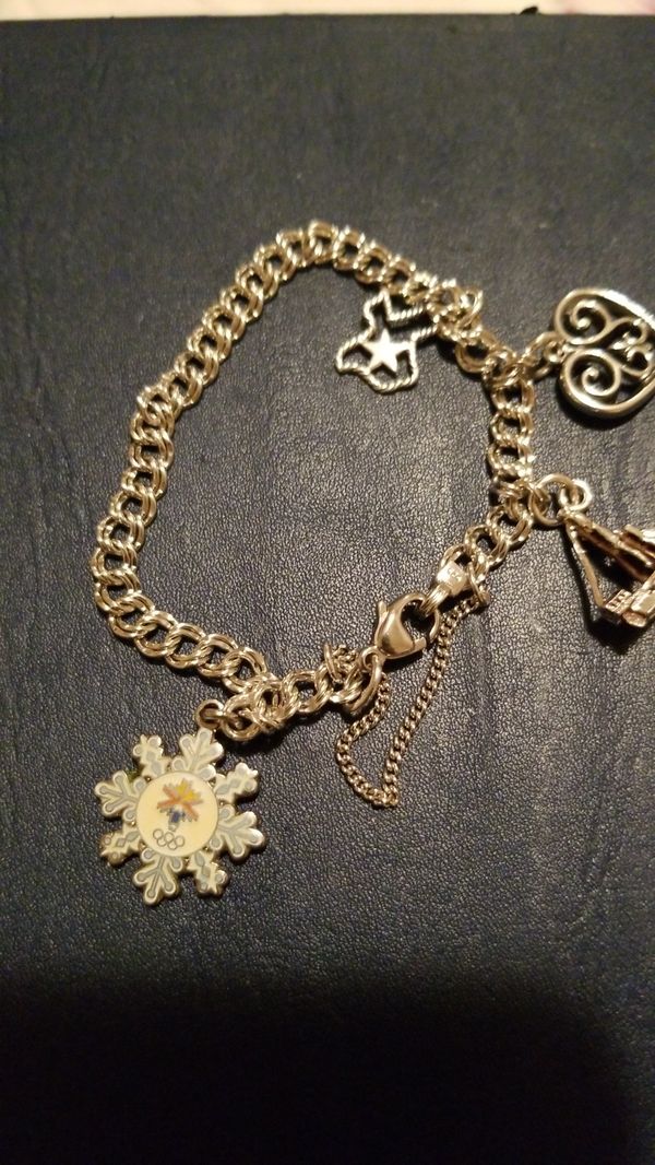 James Avery charm bracelet with 4 charms for Sale in