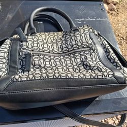 Time and Tru Women's Multi-Compartment Marli Convertible Satchel Handbag with a black and white geometric pattern. 