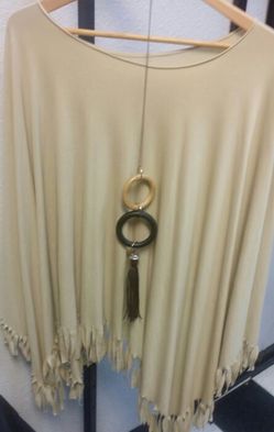 Beige fringe poncho