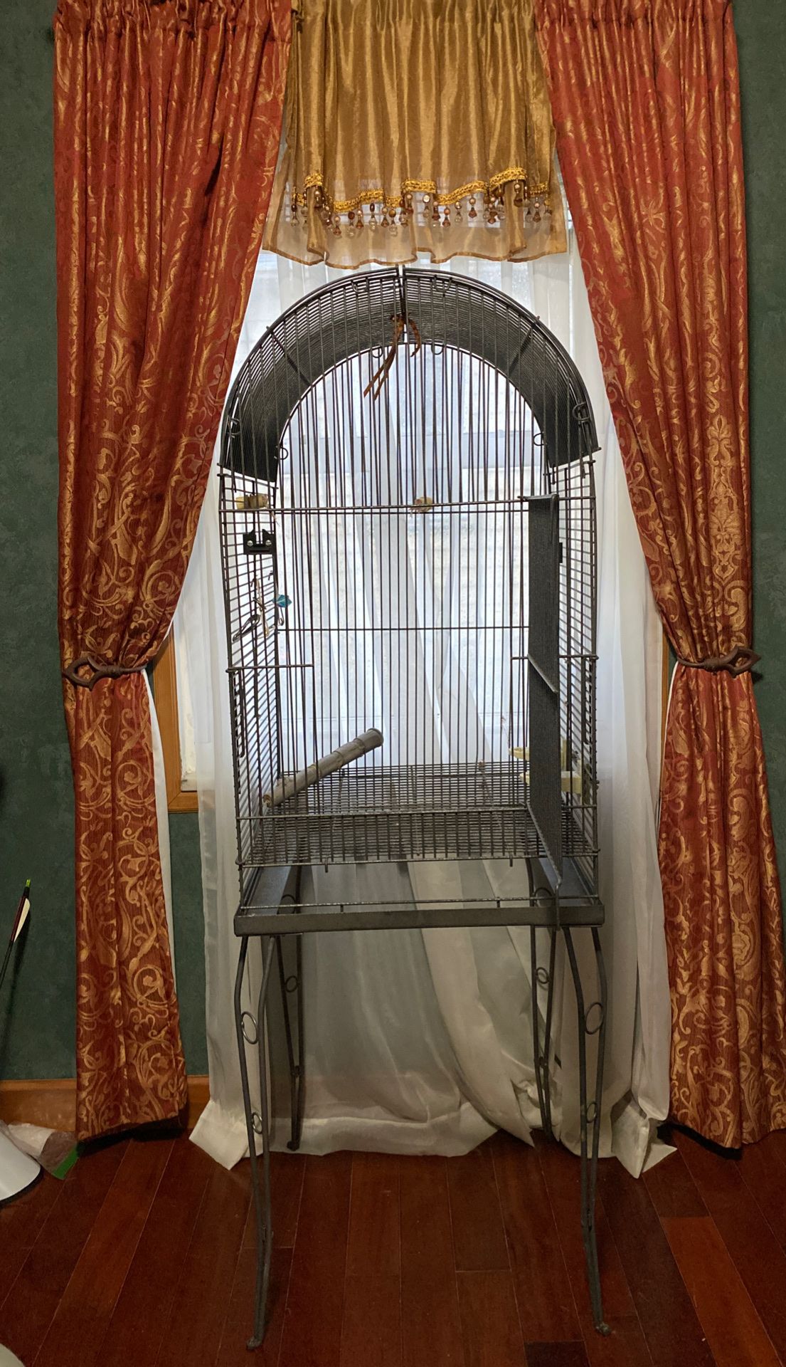 Bird Cage. 20 in wide by 35 inches without stand or 60 inches when on stand.