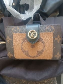 Louis Vuitton reverse Monroe wallet New condition beautiful