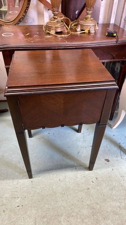 1950’s sewing machine and cabinet