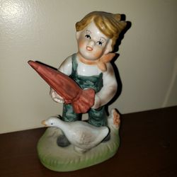 Boy porcelain figurine with his duck & umbrella 6" tall