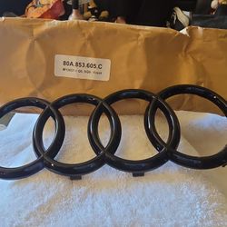 Genuine OEM Audi gloss black front grille emblem rings badge
