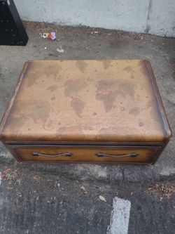Map of the world.\Coffee table.\Chest