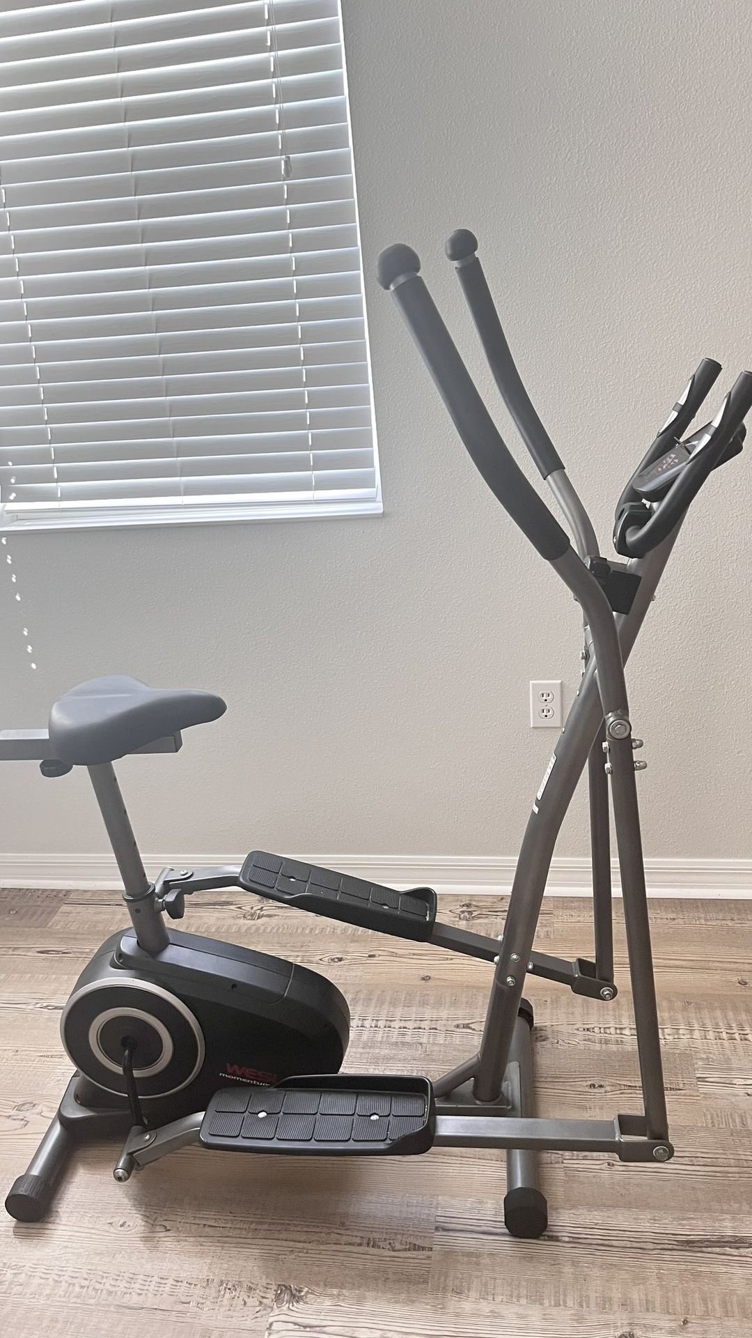 Elliptical and an exercise bike hybrid  