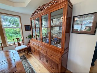Solid Rosewood China Buffet with glass doors.