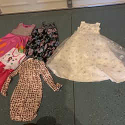 All New Dresses Never Used 7-12