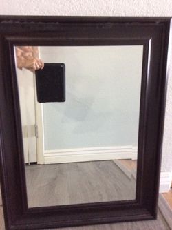 A beautiful mirror 21 1/2 and with 27 1/2 in length excellent condition got at Lowe’s and pay $50 $15 today espresso Frame