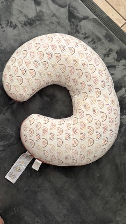 Original Boppy with dark orange rainbow pattern