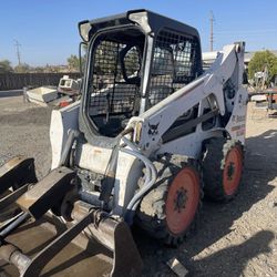 Bobcat Skid S650 **Well Maintenance With 5 Attachments**