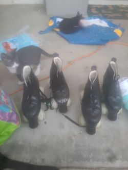 Two pair of light up wheel skates
