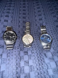 2 Bulova and 1 Burberry Watch