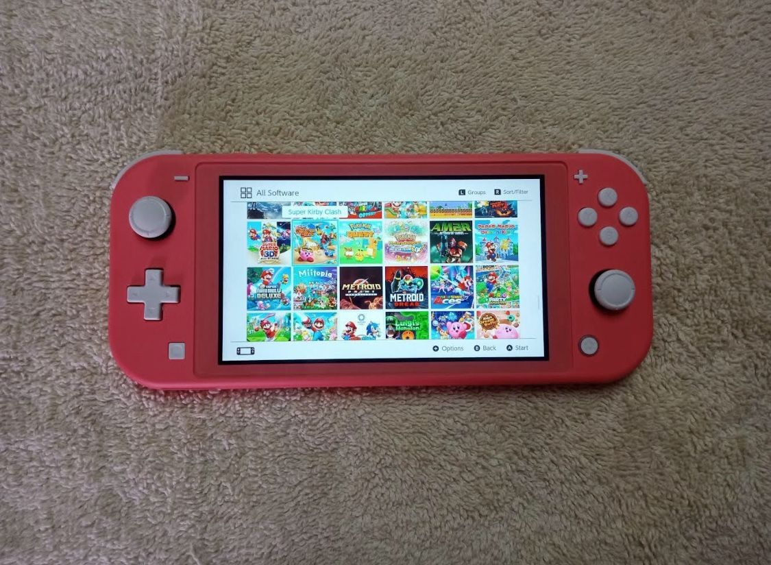 Nintendo Switch Lite With 100 Switch Games