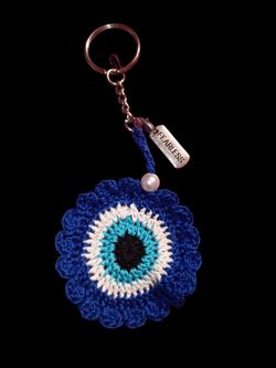 Crochet evil eye keychain.
