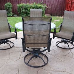 Outdoor Dining Set with 4 Swivel Rocker Chairs