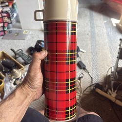 Vintage original thermos with cup