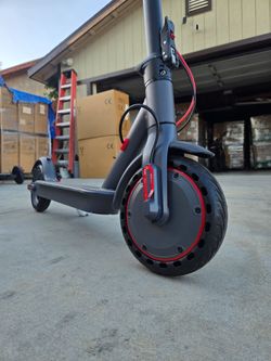 Black Electric Scooter with Red Accents