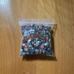 Small Bag Of Beads And Jewelry Supplies 