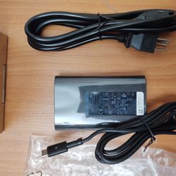 Brand new USB type C charger for laptops, cell phone, iphones, etc. 65W 19.5V, 15V 5V auto detection. 
Brand New. Branded as Dell but Fit Mos 