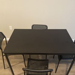 1 Year Old  Black IKEA Table With 4 Chairs 