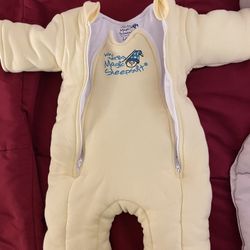 baby merlin sleep suit and size 1 diapers 