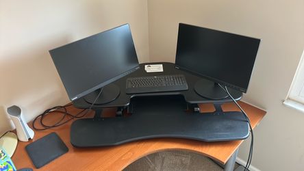 Varidesk corner computer stand