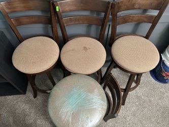 Dark brown wooden stool
