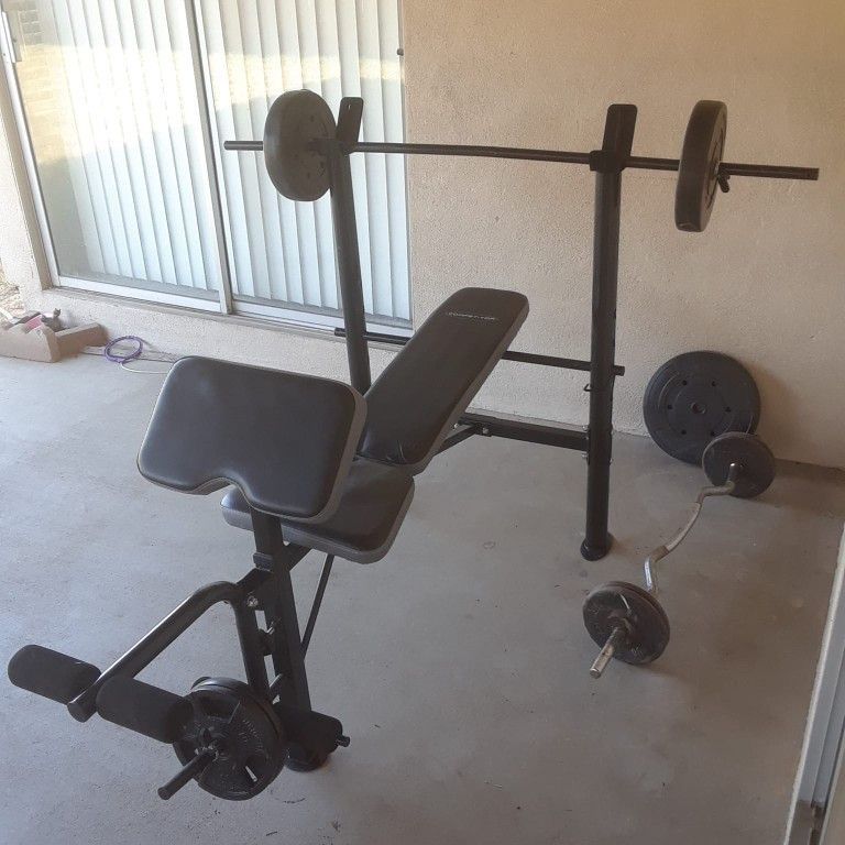 Used good condition weight bench and weights