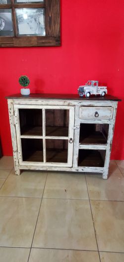 Small cabinet w/ drawer on White or cream