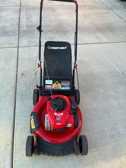 Lawnmower, troy Bilt push lawnmower starts right up runs perfect. Very little use.