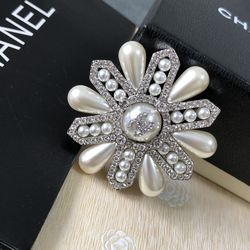 Chanel brooch Chanel flower brooch with crystals and pearls Chanel brooch  Chanel flower brooch with crystals and pearls for Sale in Adelaide, CA 