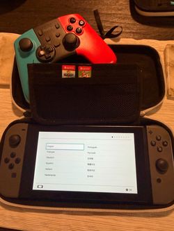 Nintendo Switch with Case, Controller & 2 Games