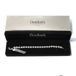 Brand new .925 silver diacut bead, strand bracelet. Retails for $160.