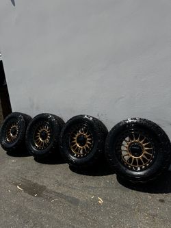 KMC KM552 IMS 8x6.5 20” Wheels Bronze with 35” Toyo Open Country AT3 All-Terrain Tires