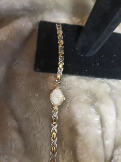 Vintage Waltham silver and gold. x's and o's watch. With crystal accents on dial. very rare. hard to find.