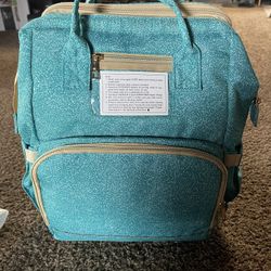 Diaper bag backpack w/ changing station 