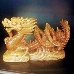 Chinese Dragon That Brings The Good Luck Carved Out Of Wood