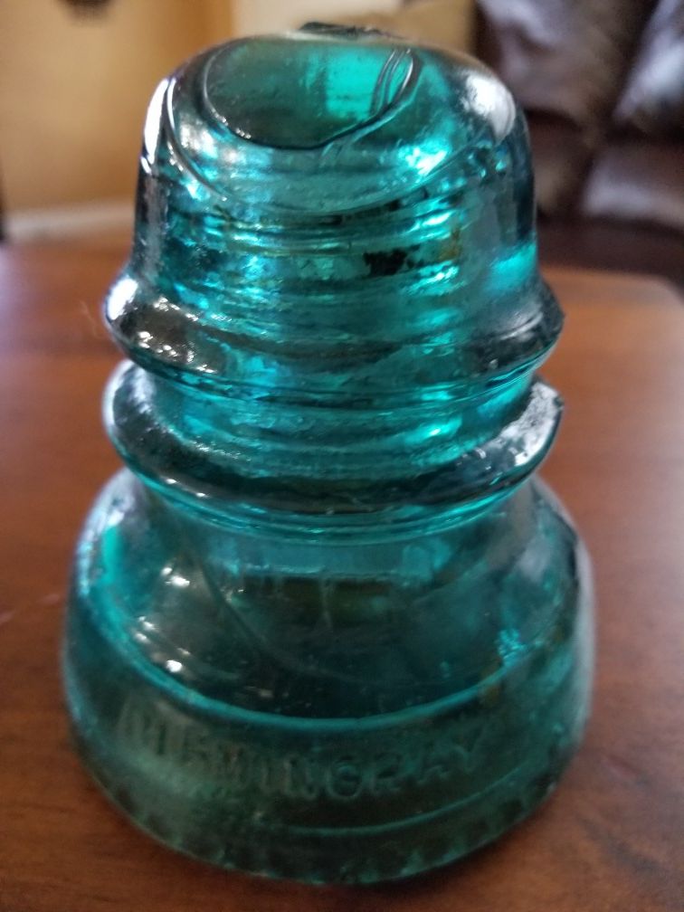 Antique glass insulators