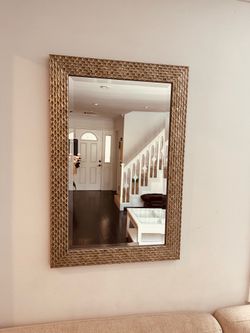 Mirror with decorative frame