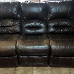 Brown 3 seater leather couch