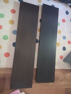 Two ikea black-brown floating shelves