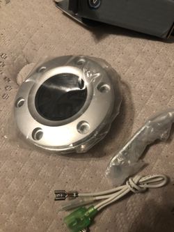 Upgraded horn button for aftermarket wheels