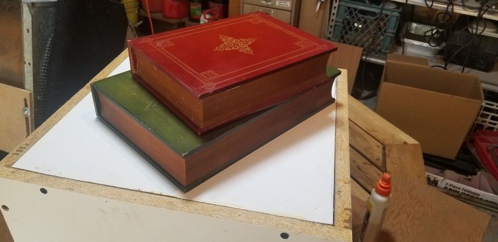 Coffee table books with secret storage (they are actually wood)