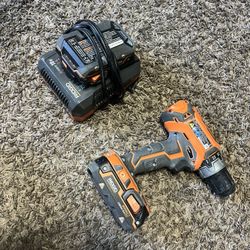 Drill With Charger And Two Batteries 